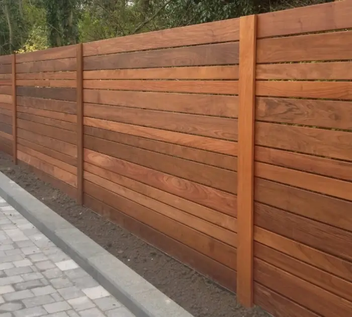 Wood privacy fence with picket detail installed by Wulff Fence